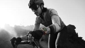 A biker wearing a smartwatch.